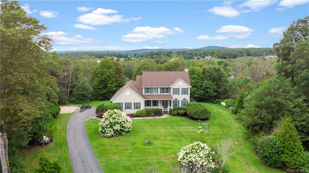 a aerial view of a house with garden