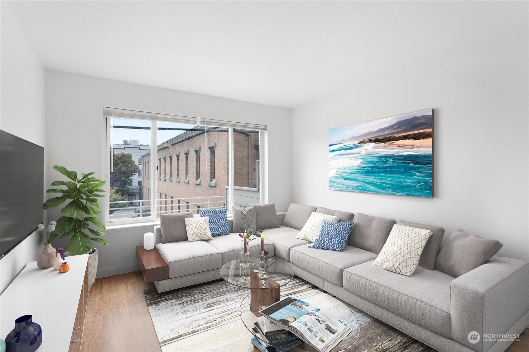 a living room with furniture and a large window