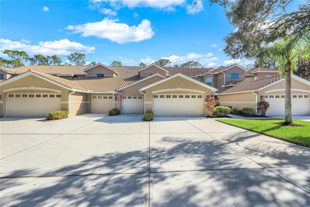 View of front of home featuring a garage