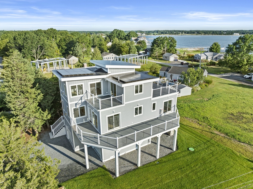 an aerial view of a house with a garden