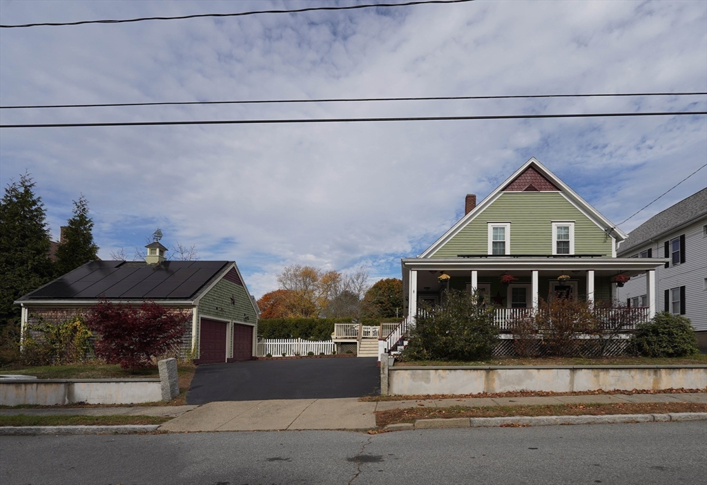 a view of a house and a street