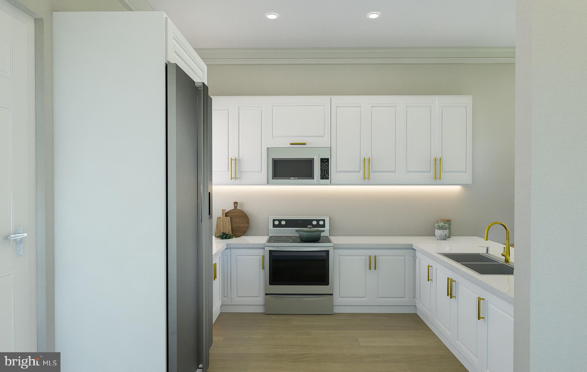 a kitchen with granite countertop white cabinets and white stainless steel appliances