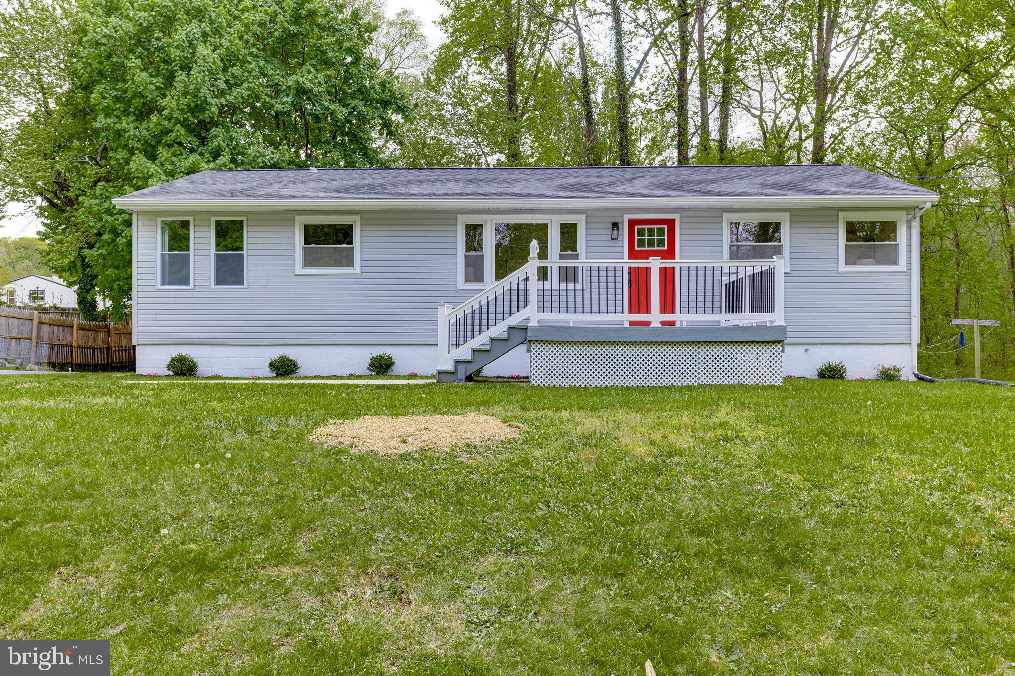 front view of a house with a yard