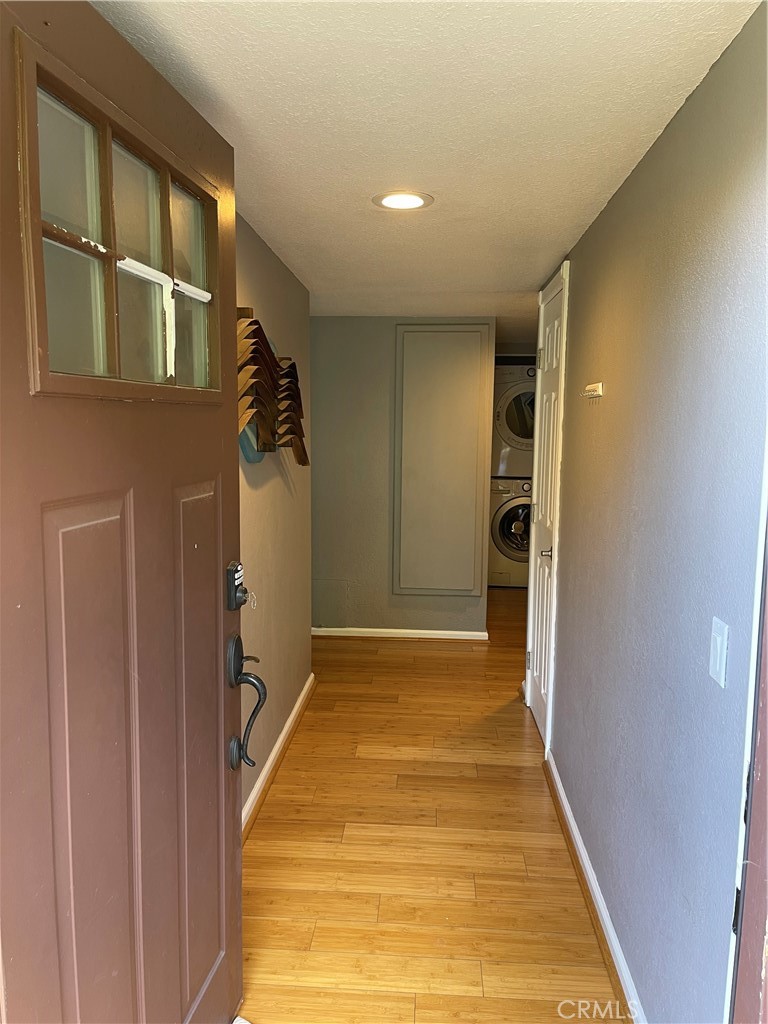 a view of a hallway with a bathroom