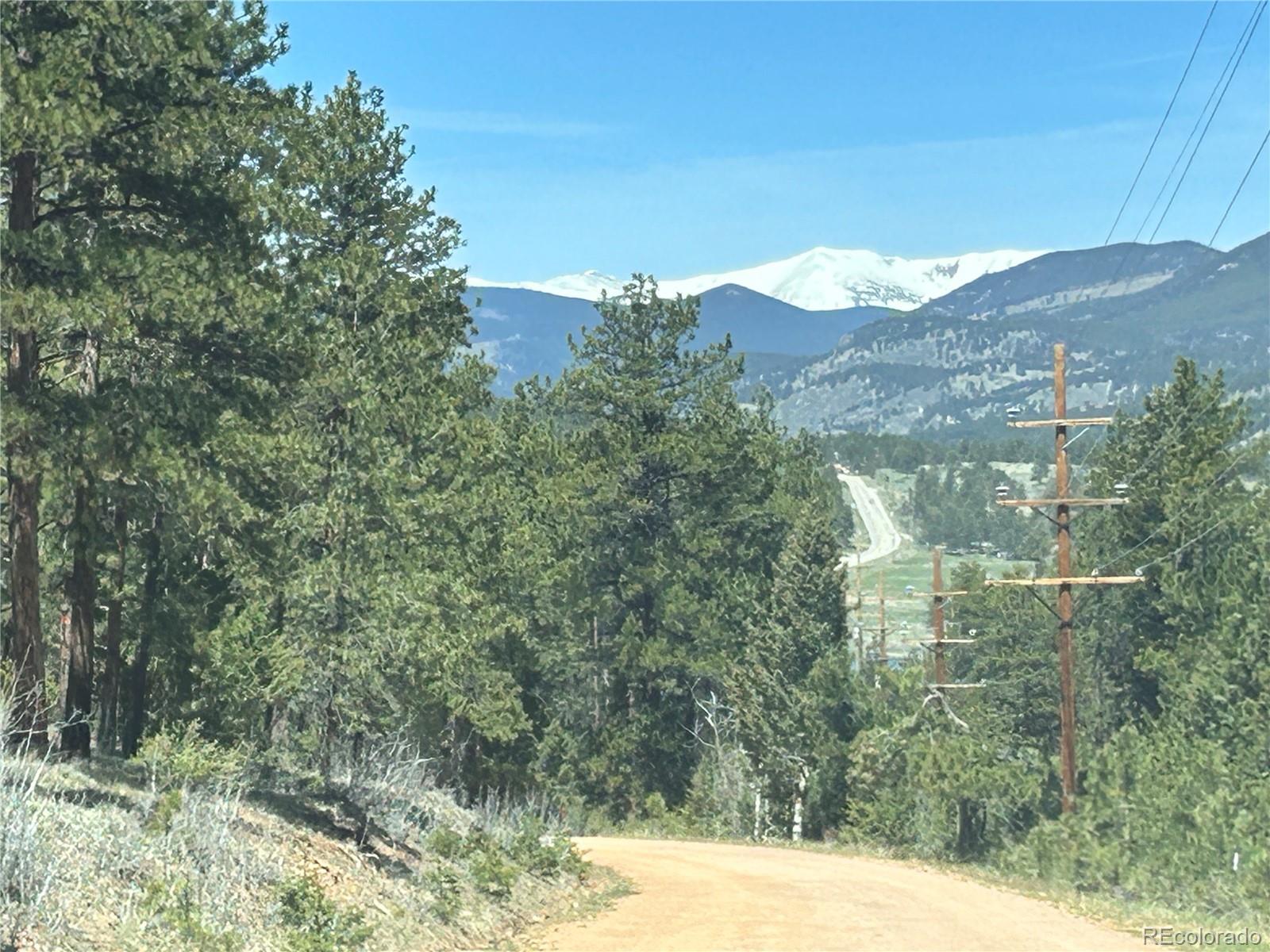 a view of a house with a mountain