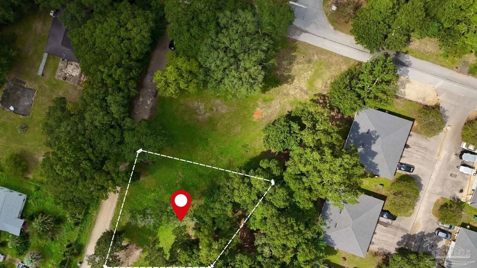 an aerial view of an house with swimming pool and garden space