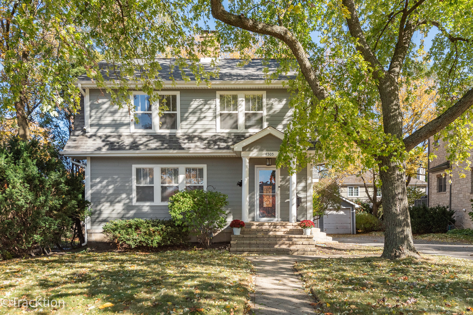 a front view of a house with a porch