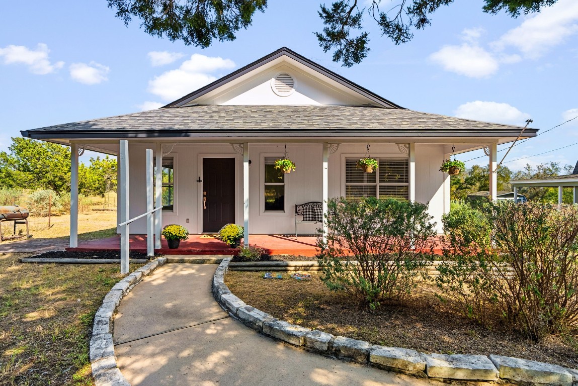 a front view of a house with porch