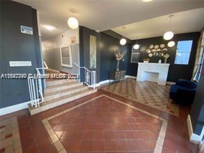 a view of a living room and bathroom