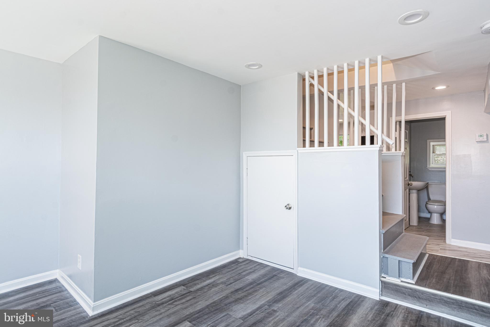 a view of entryway with wooden floor