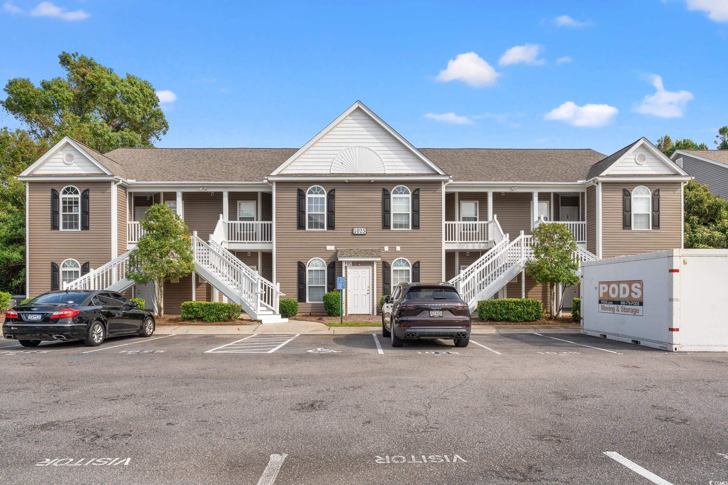 Multi unit property featuring covered porch