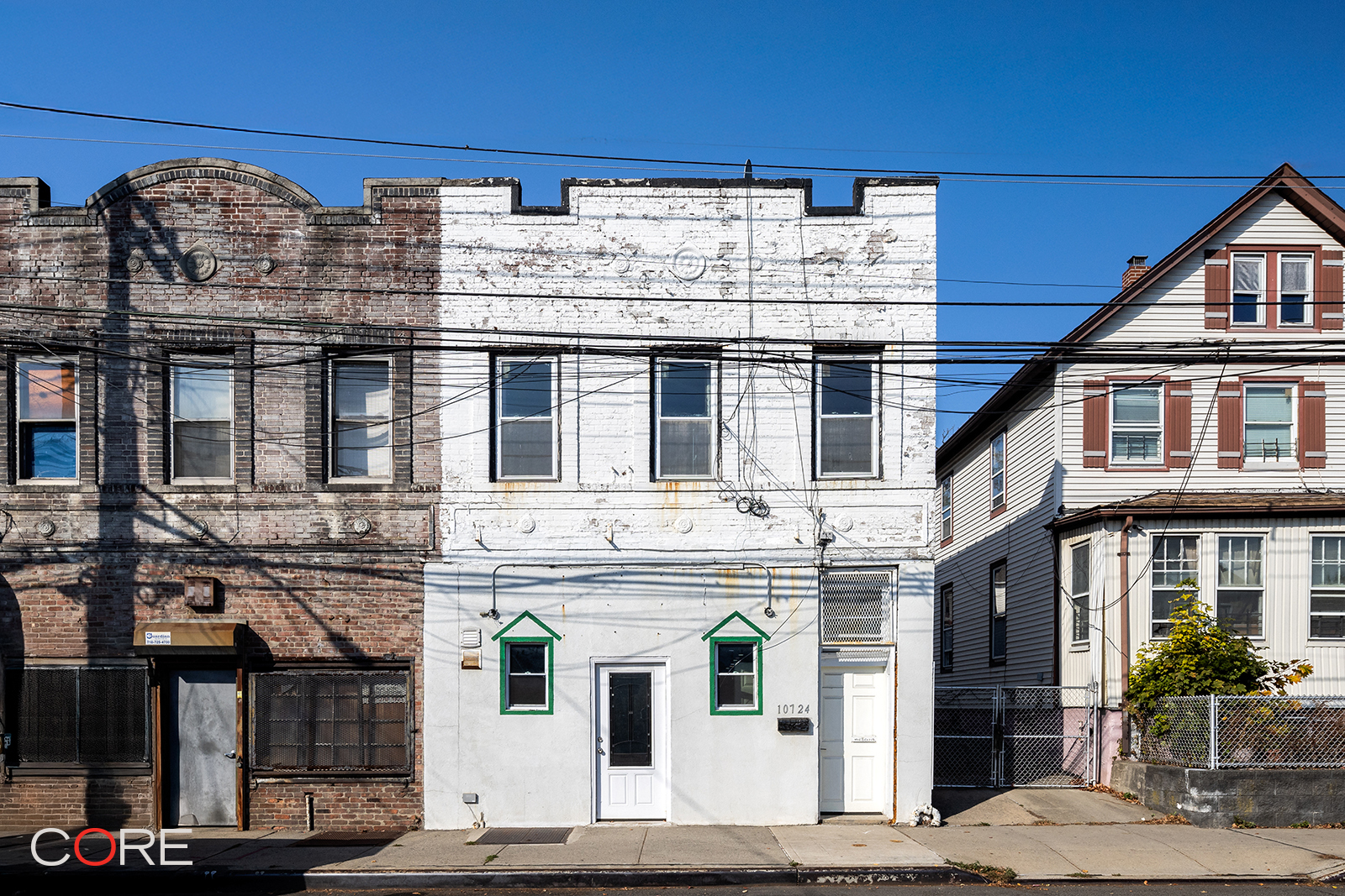 a view of a building with a street