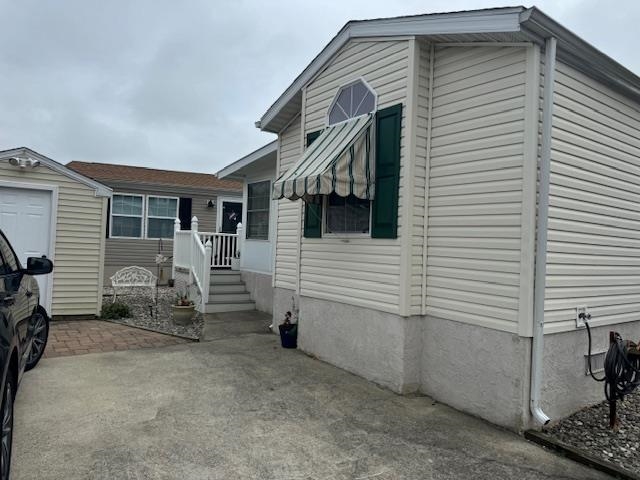 a view of house with patio