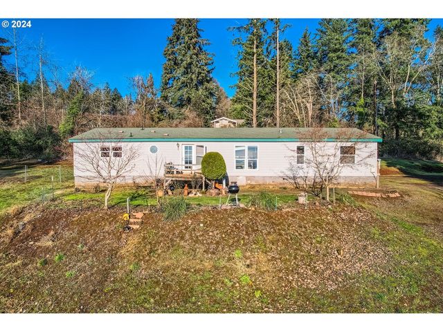 $609,900 | 22100 Northeast Logger Lane