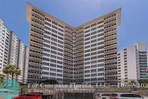 a view of a building with a street