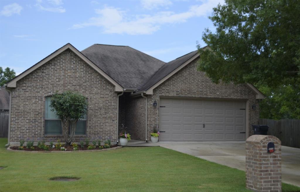 a front view of house with yard