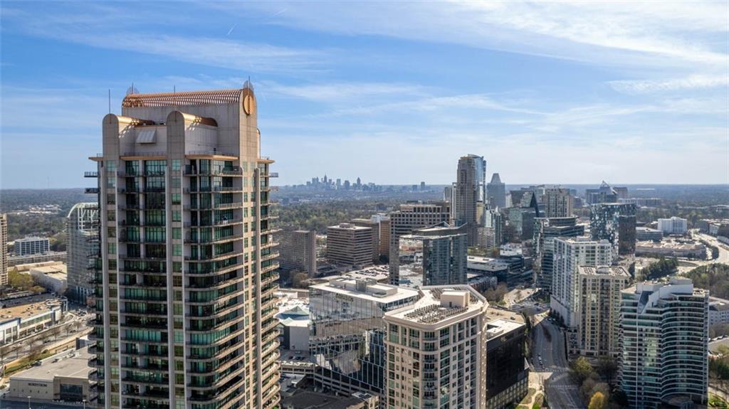 a view of a city with tall buildings