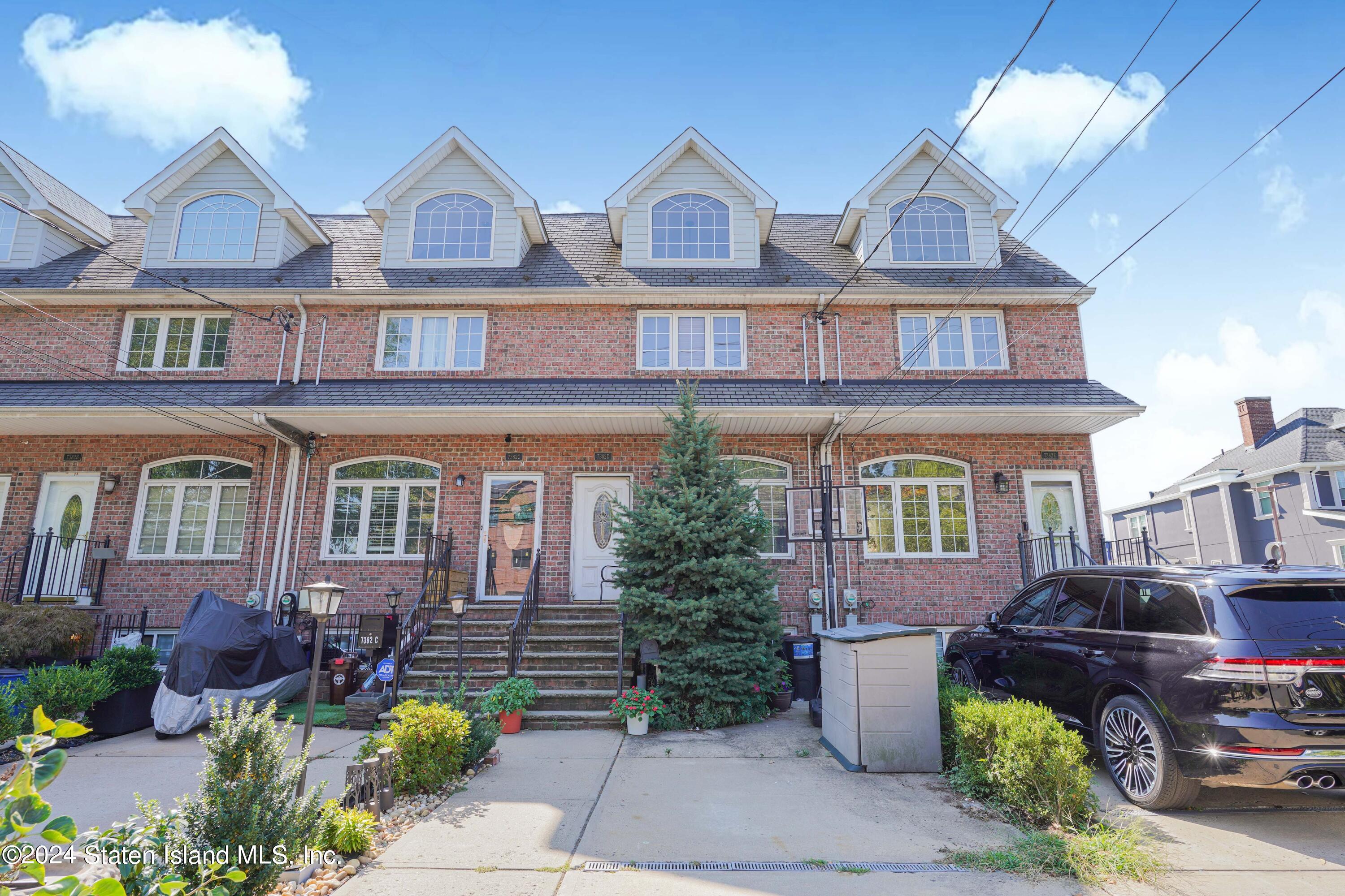 a front view of multiple houses