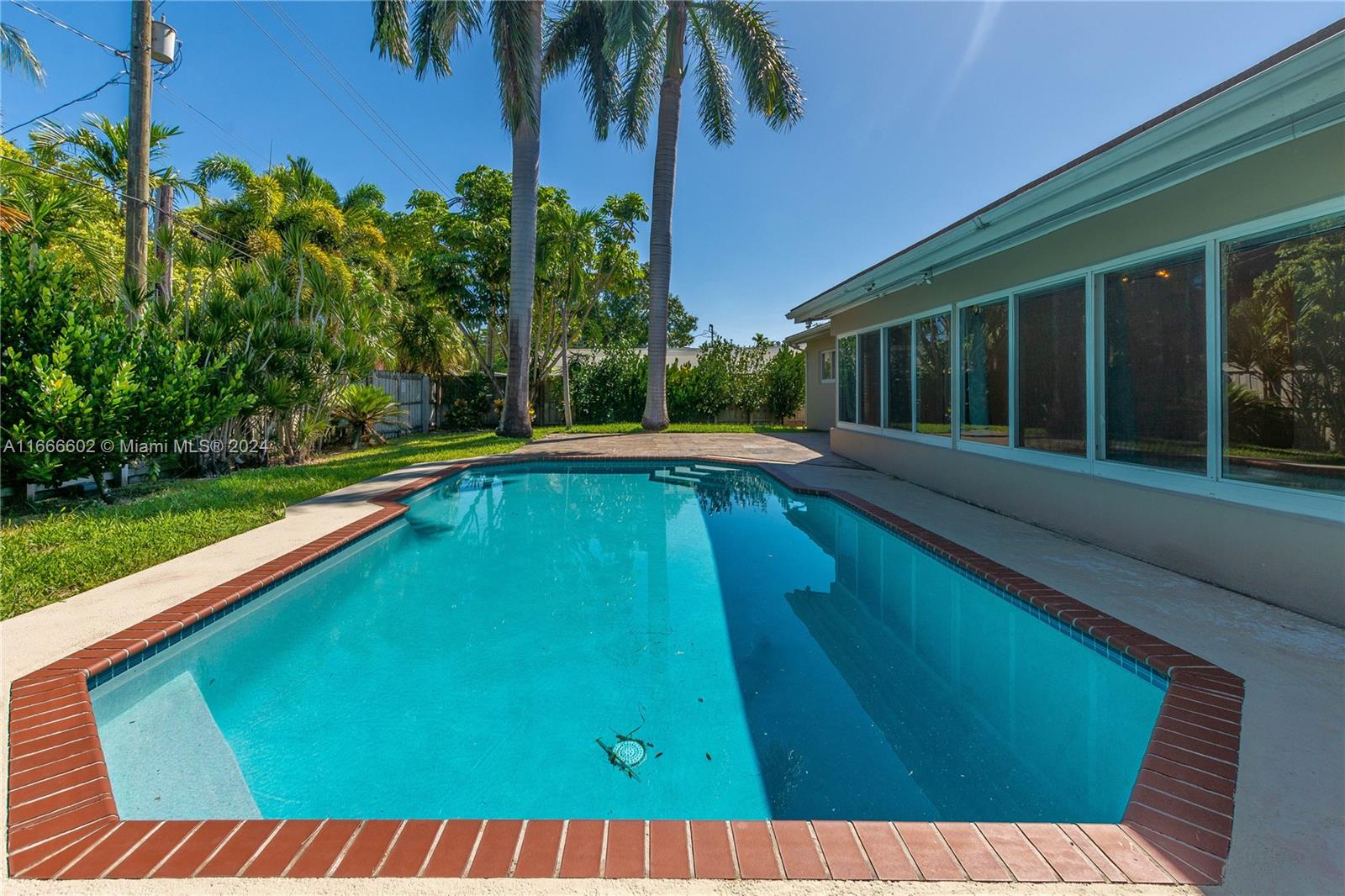 a view of swimming pool from a balcony