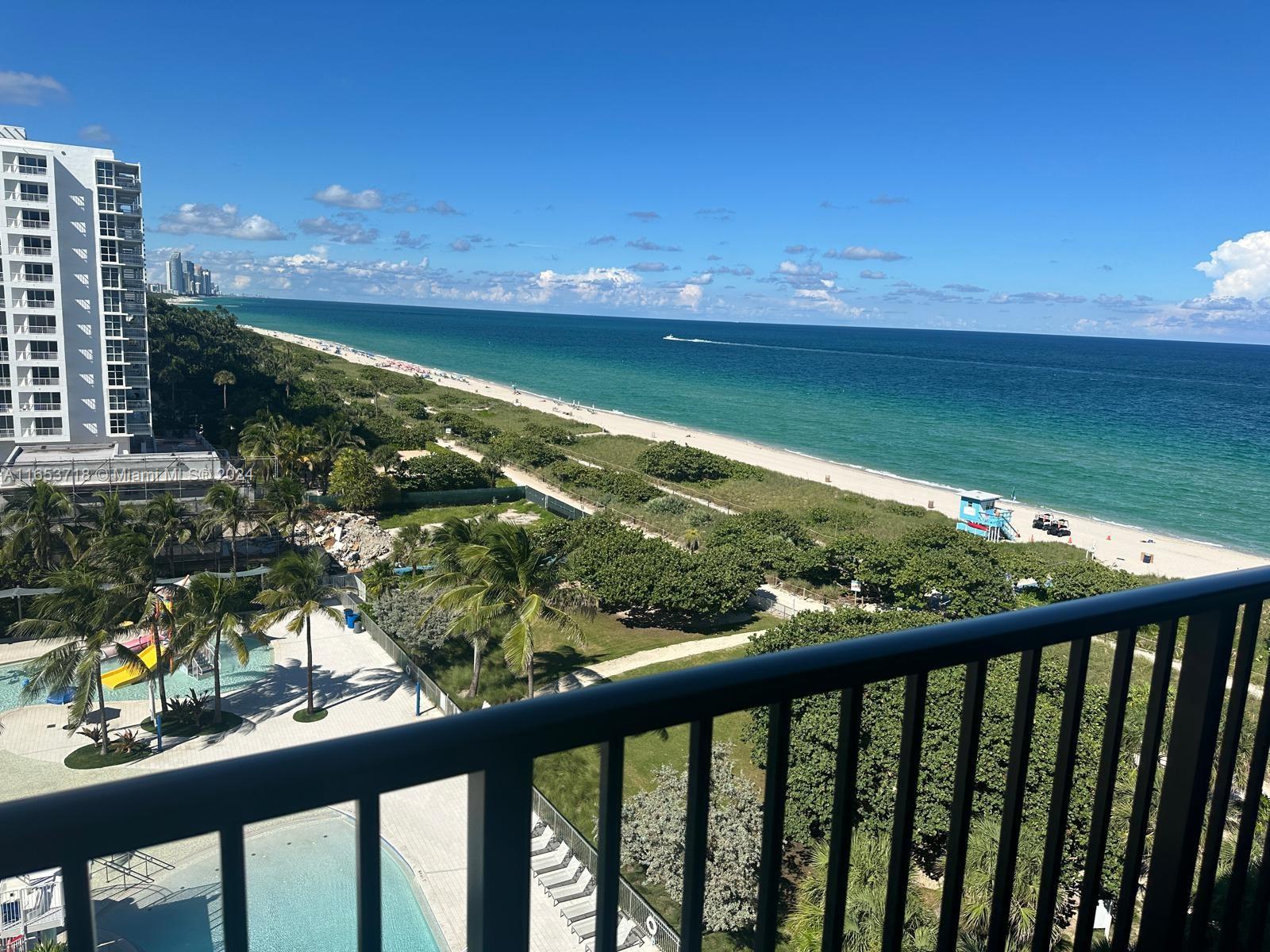 a view of a lake from a balcony