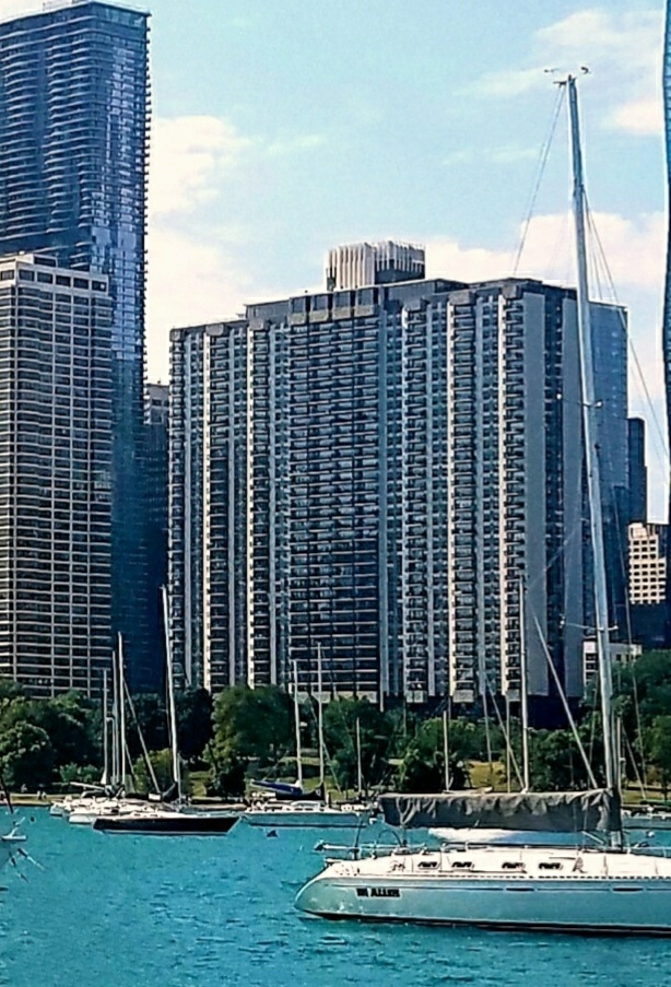 a view of a building with a yard