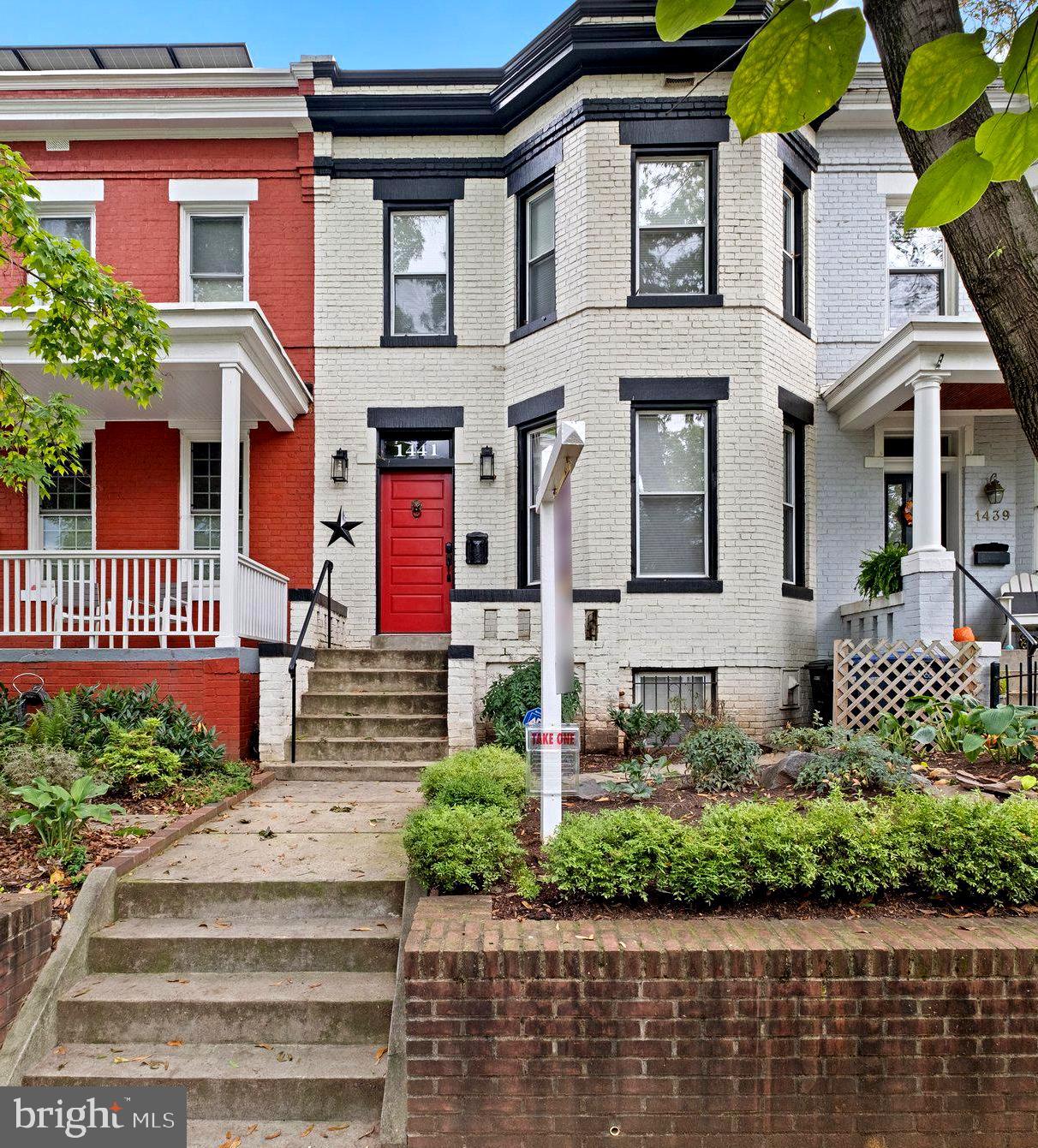 a front view of a multi story residential apartment building