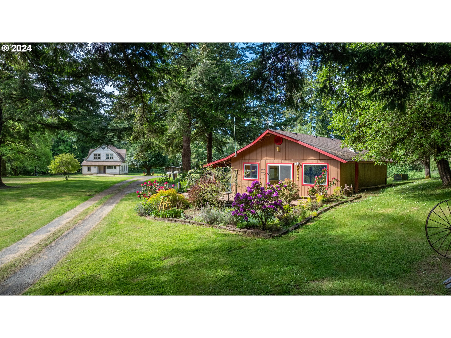 a view of a house with a yard