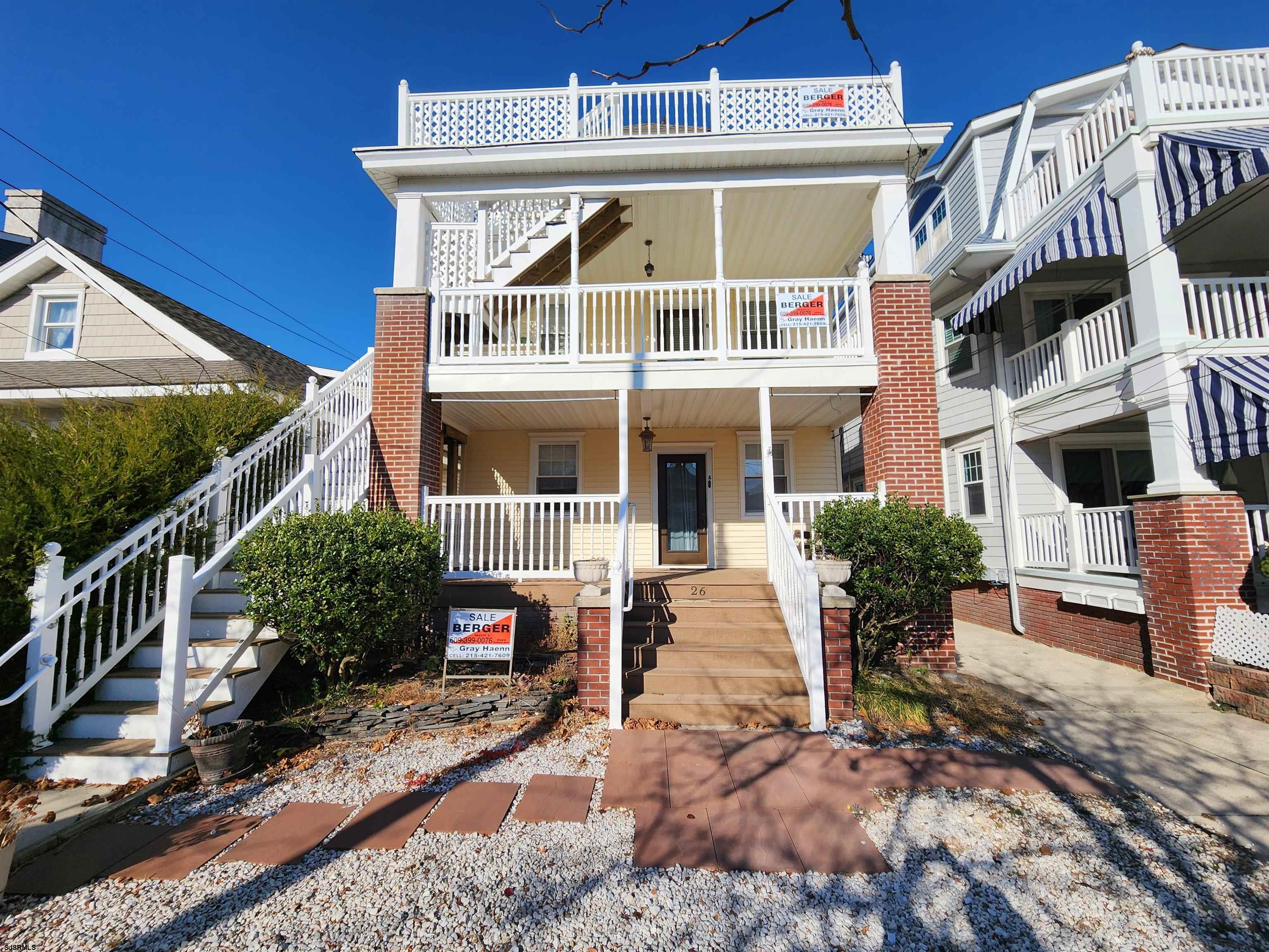 a front view of a house with a porch