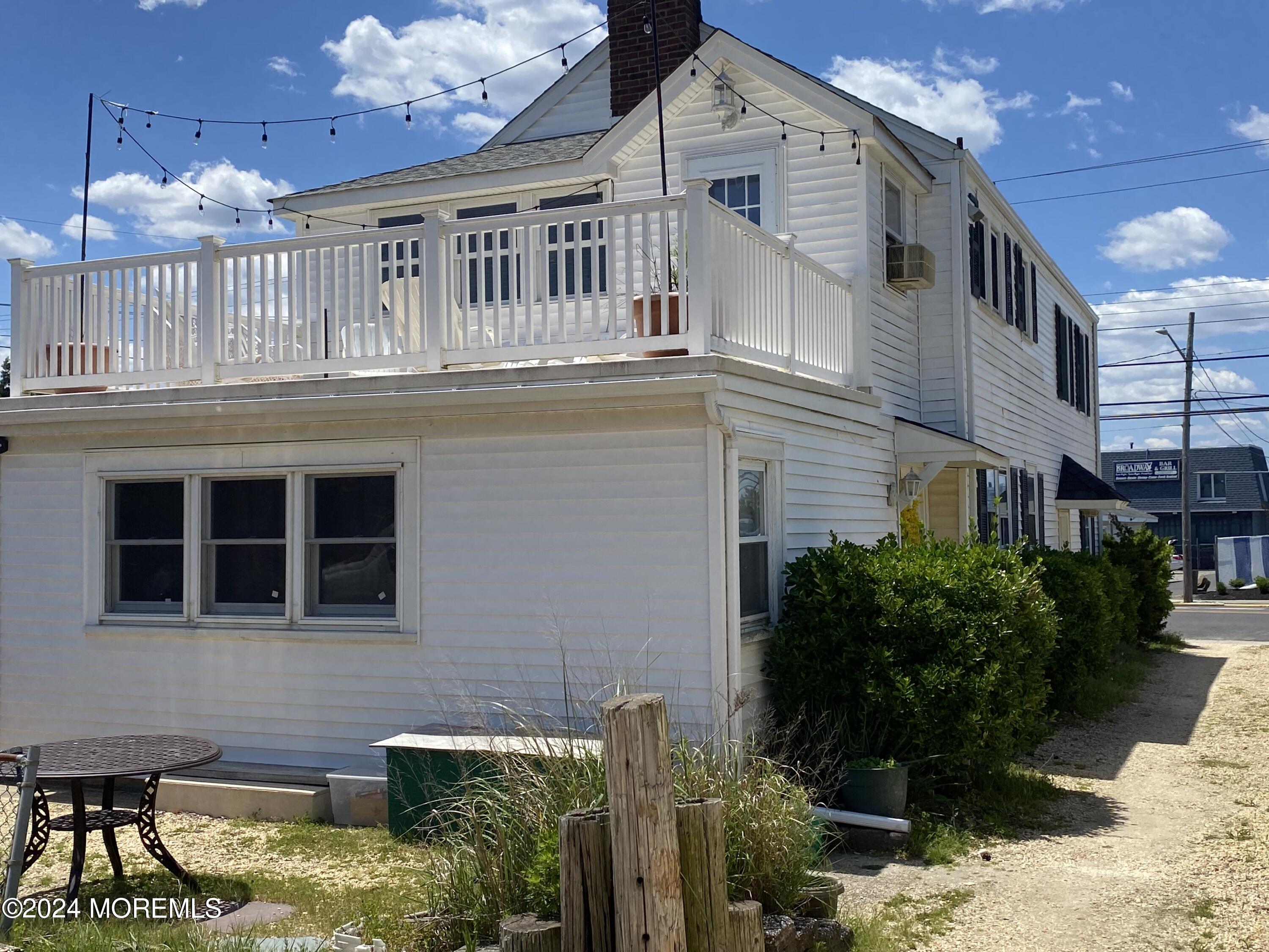 a front view of a house with balcony