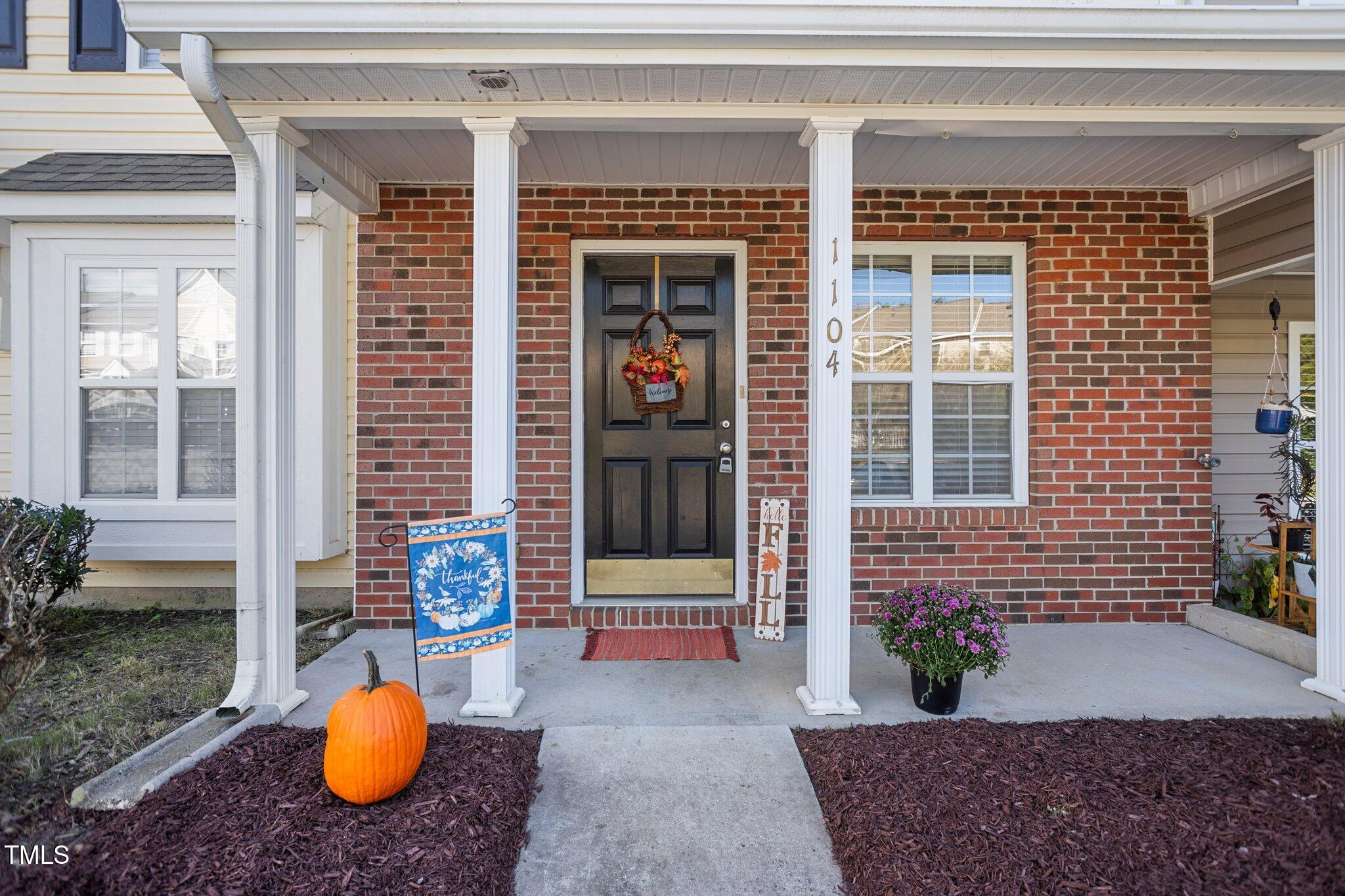 a front view of a house with an empty space