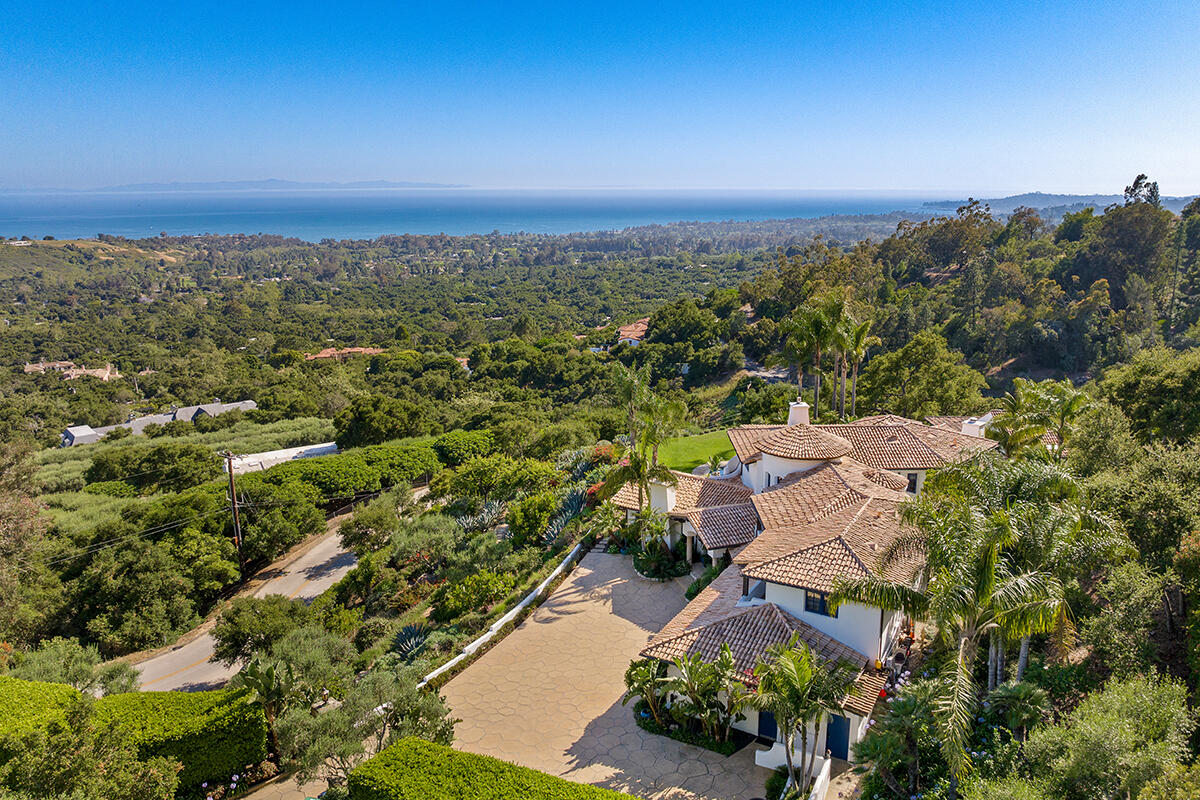 an aerial view of a house with a garden