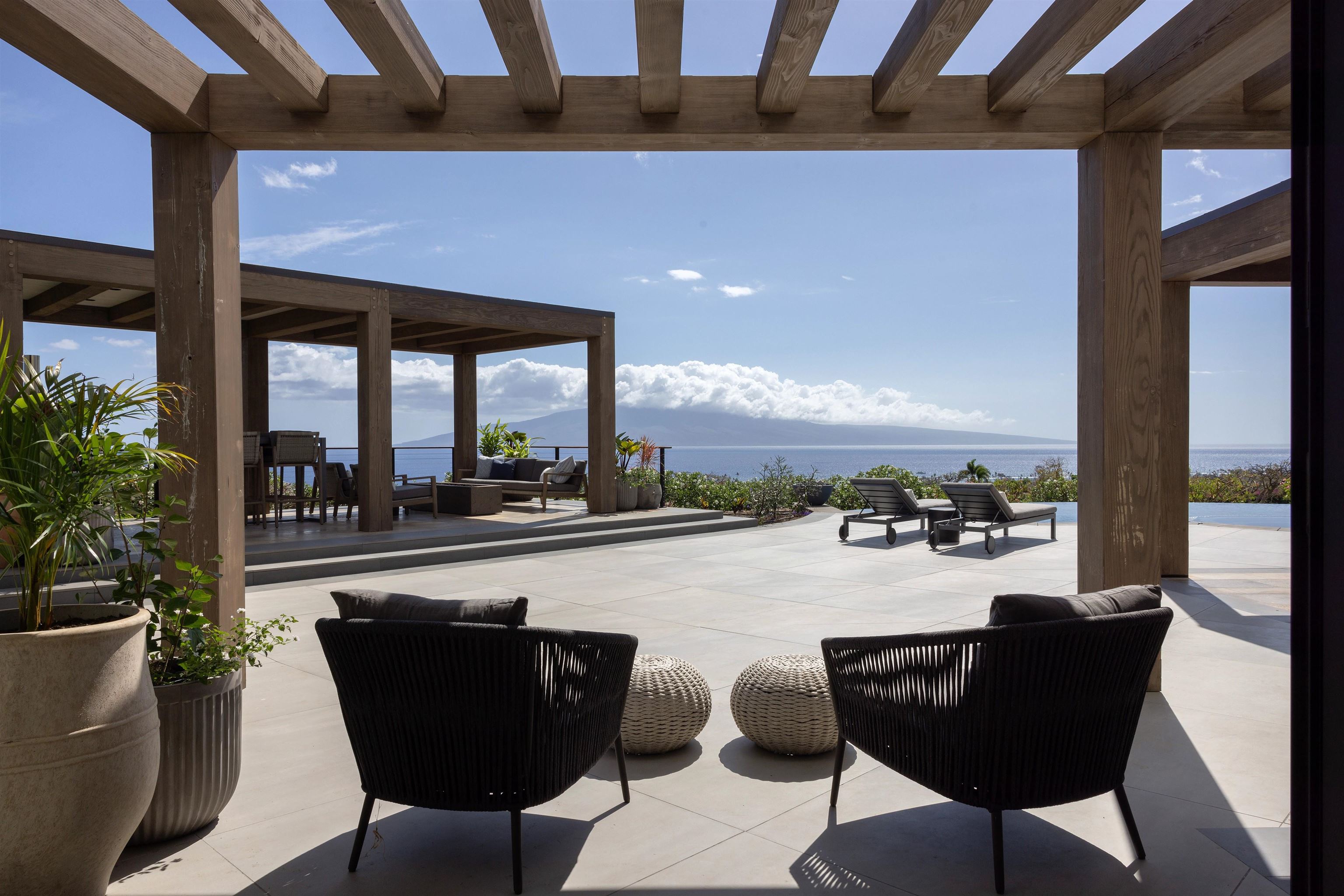 a view of a balcony with chairs