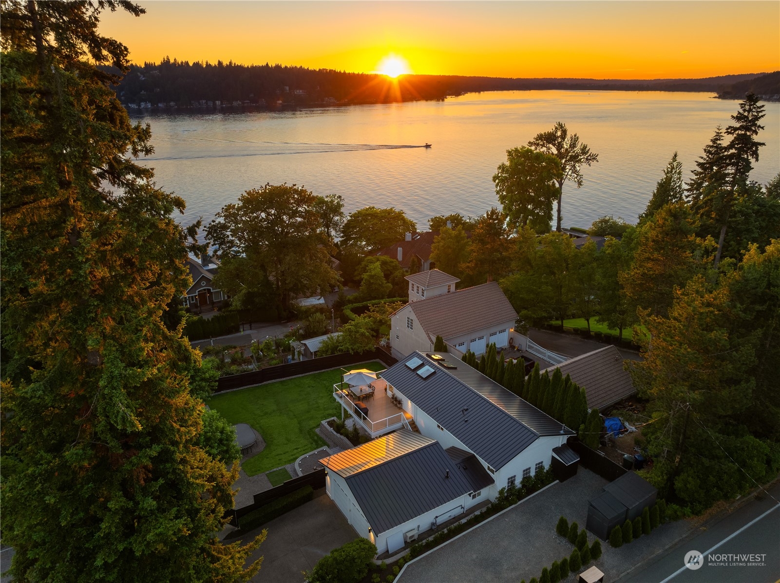 an aerial view of house with ocean view