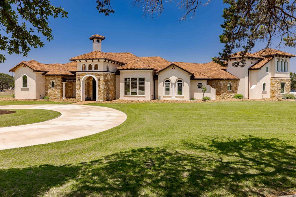 a view of a house with a big yard