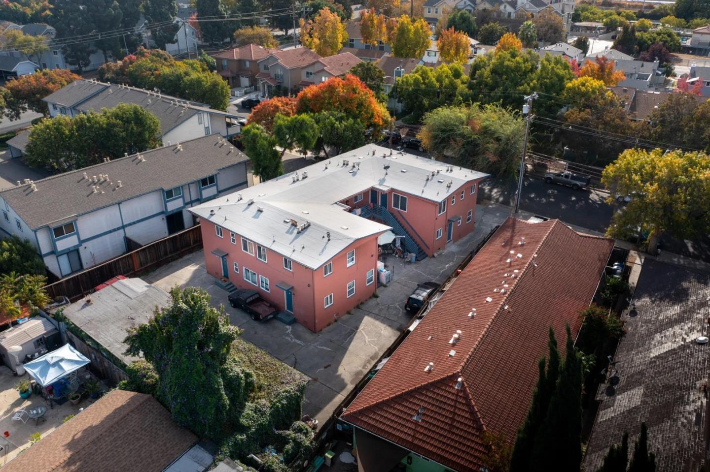 an aerial view of a house with a garden