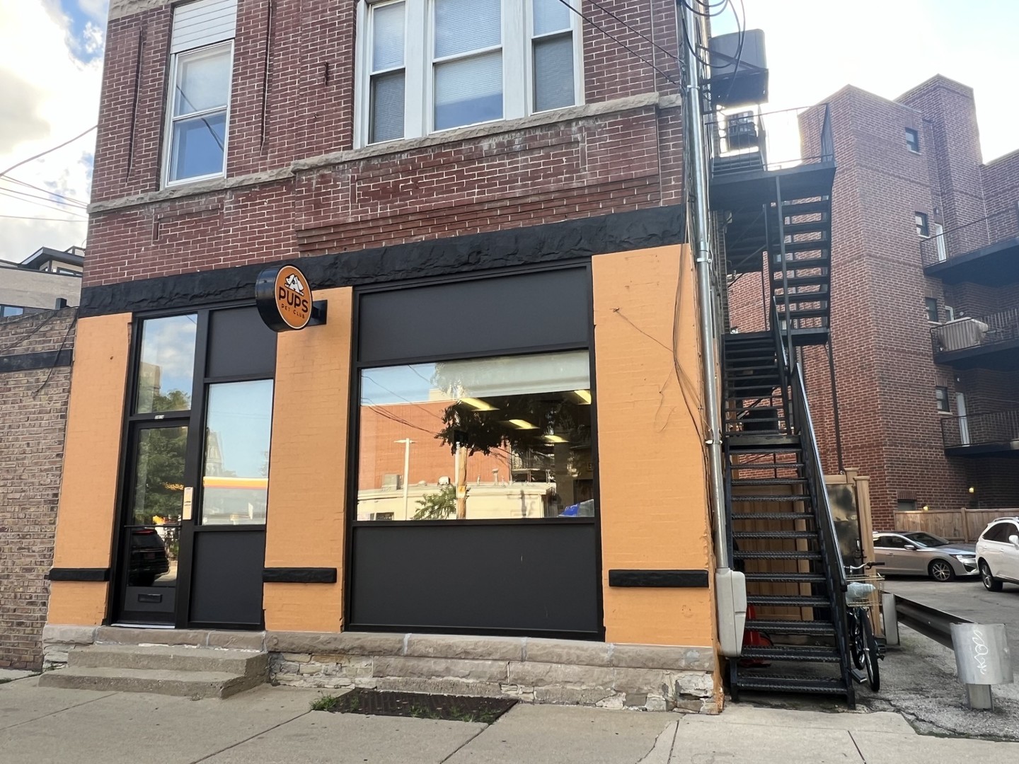 a front view of a building with a glass door