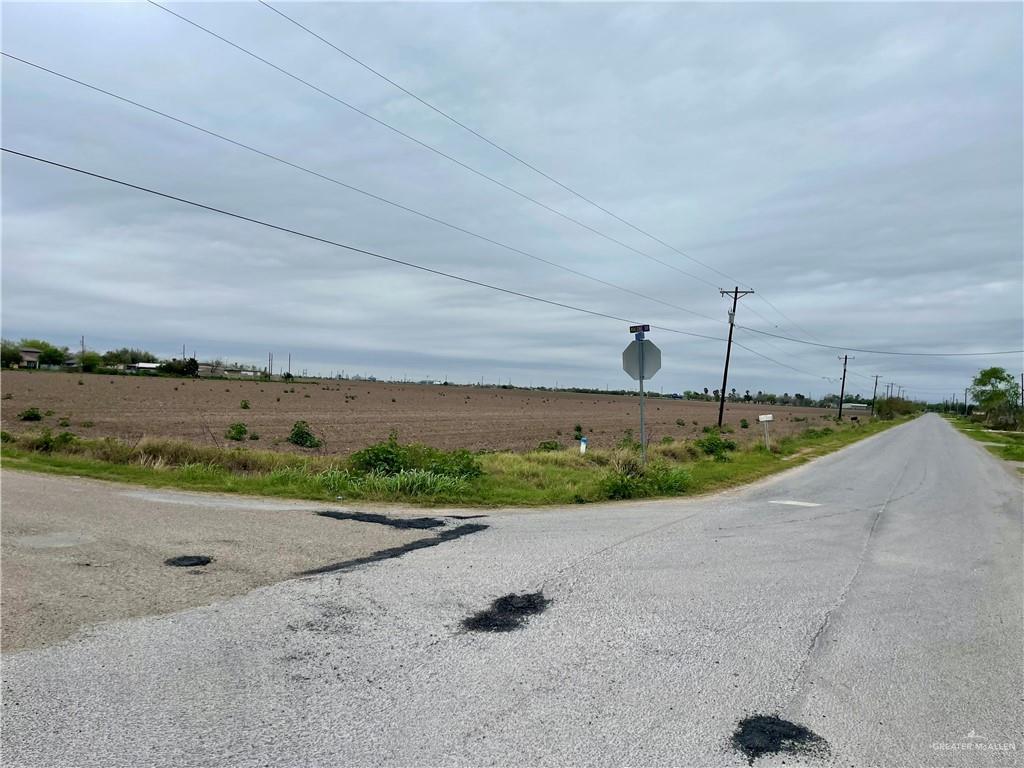 a view of a road with an ocean view