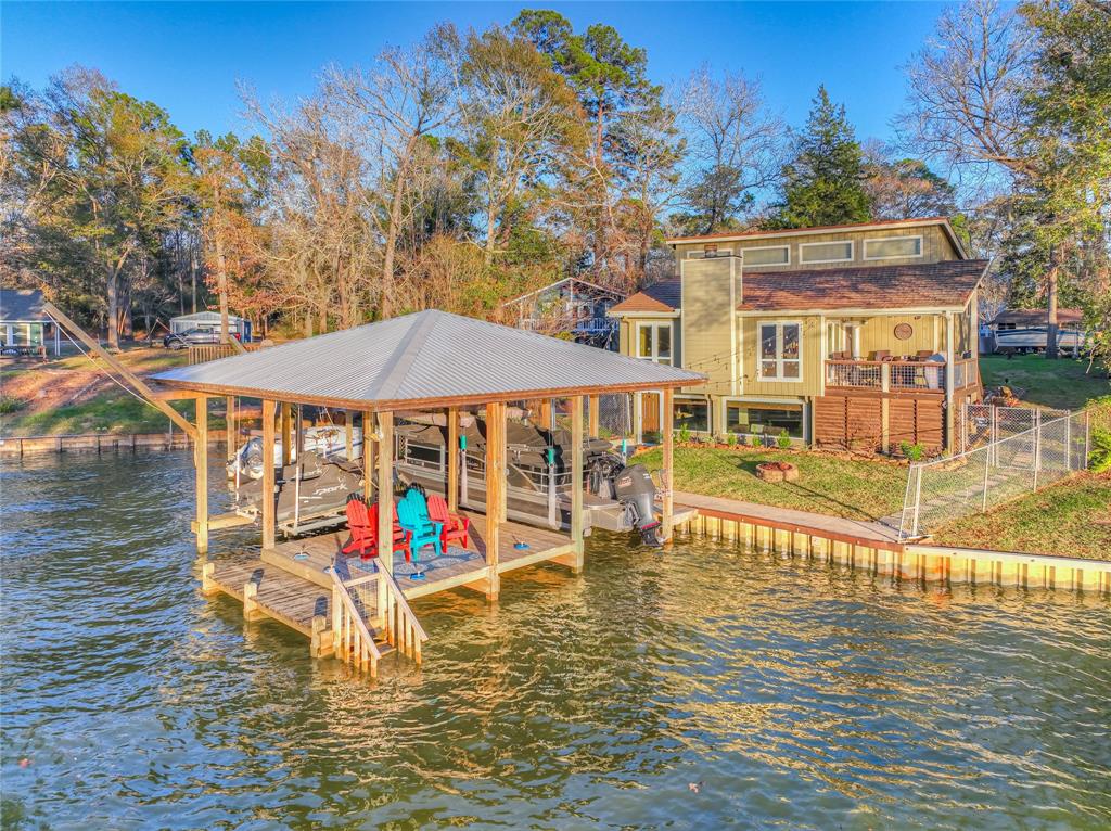 an outdoor space with pool and furniture