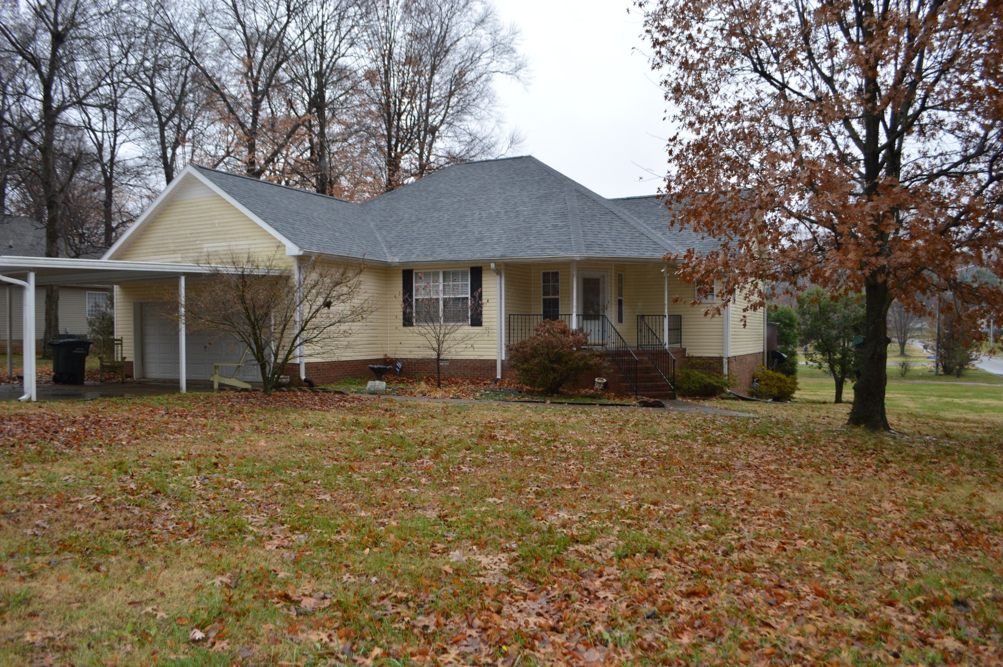 a house with trees in the background