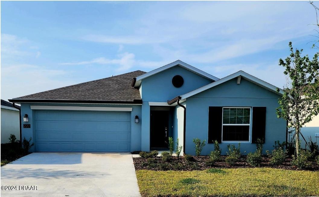 a front view of house with yard