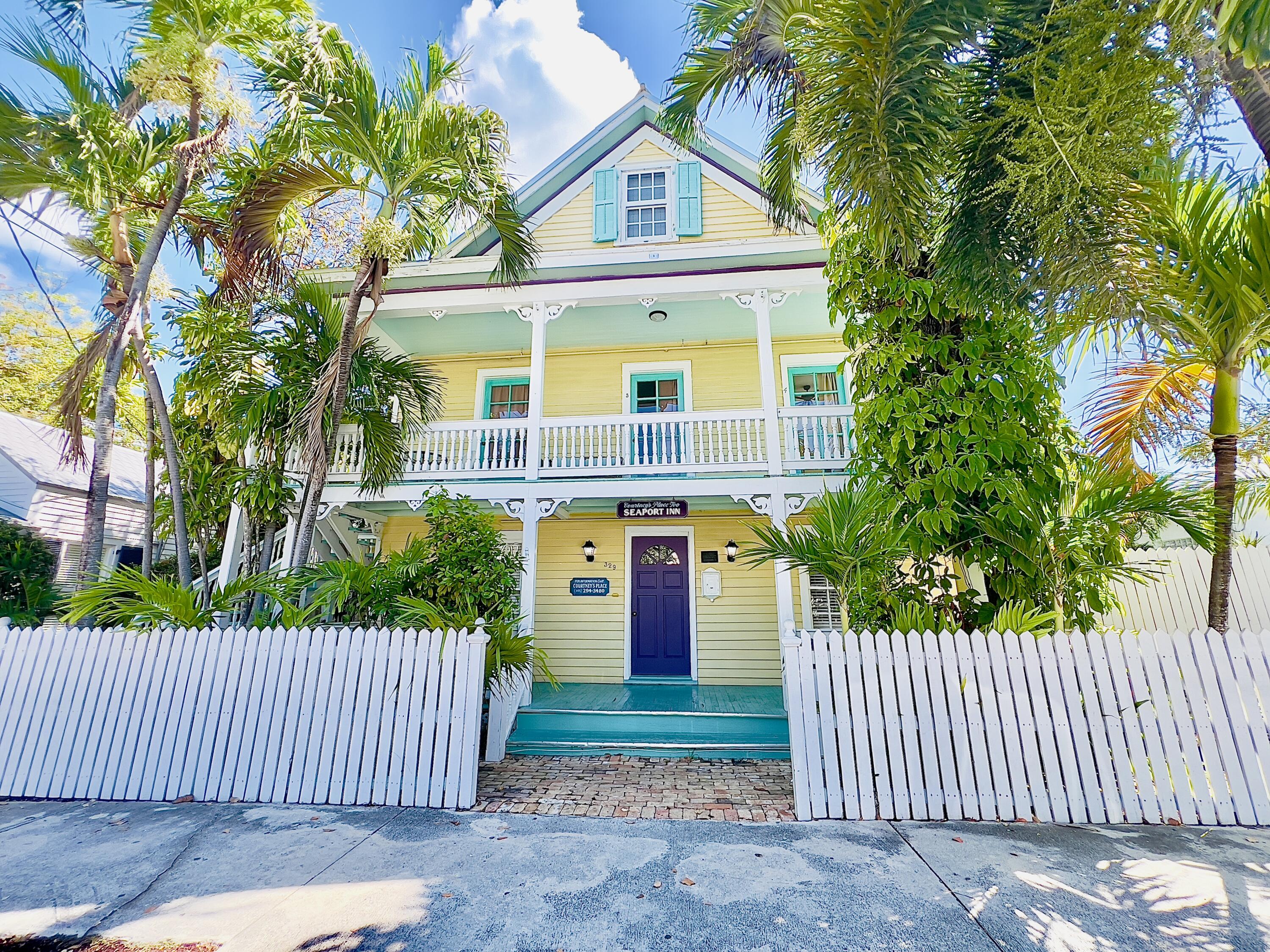 a front view of a house with a porch