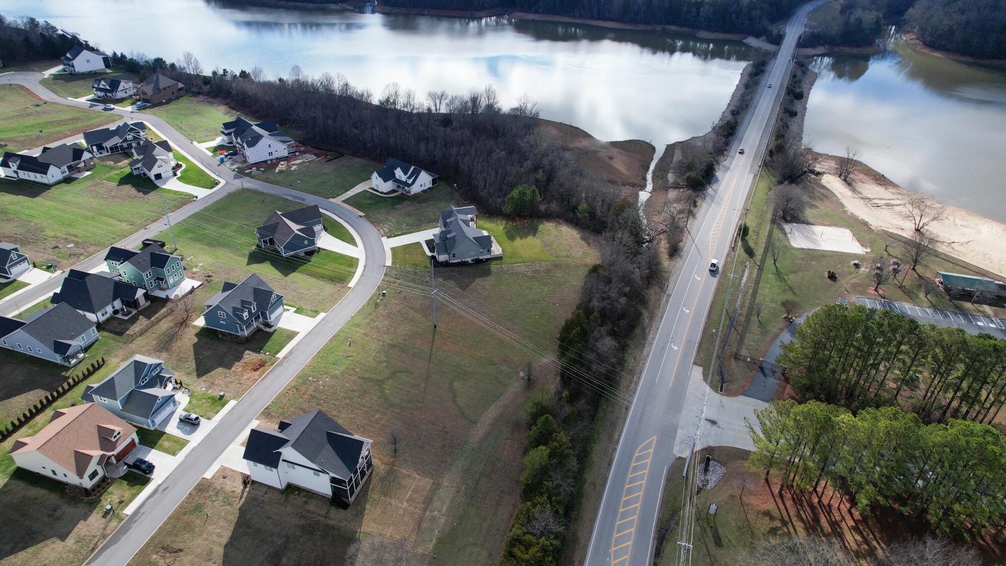 an aerial view of a residential houses with outdoor space