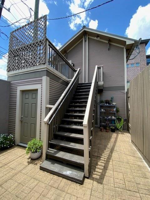 a house view with a outdoor space