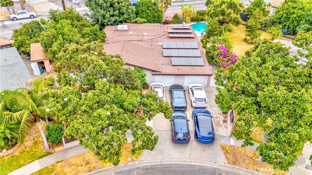 an aerial view of a house with garden