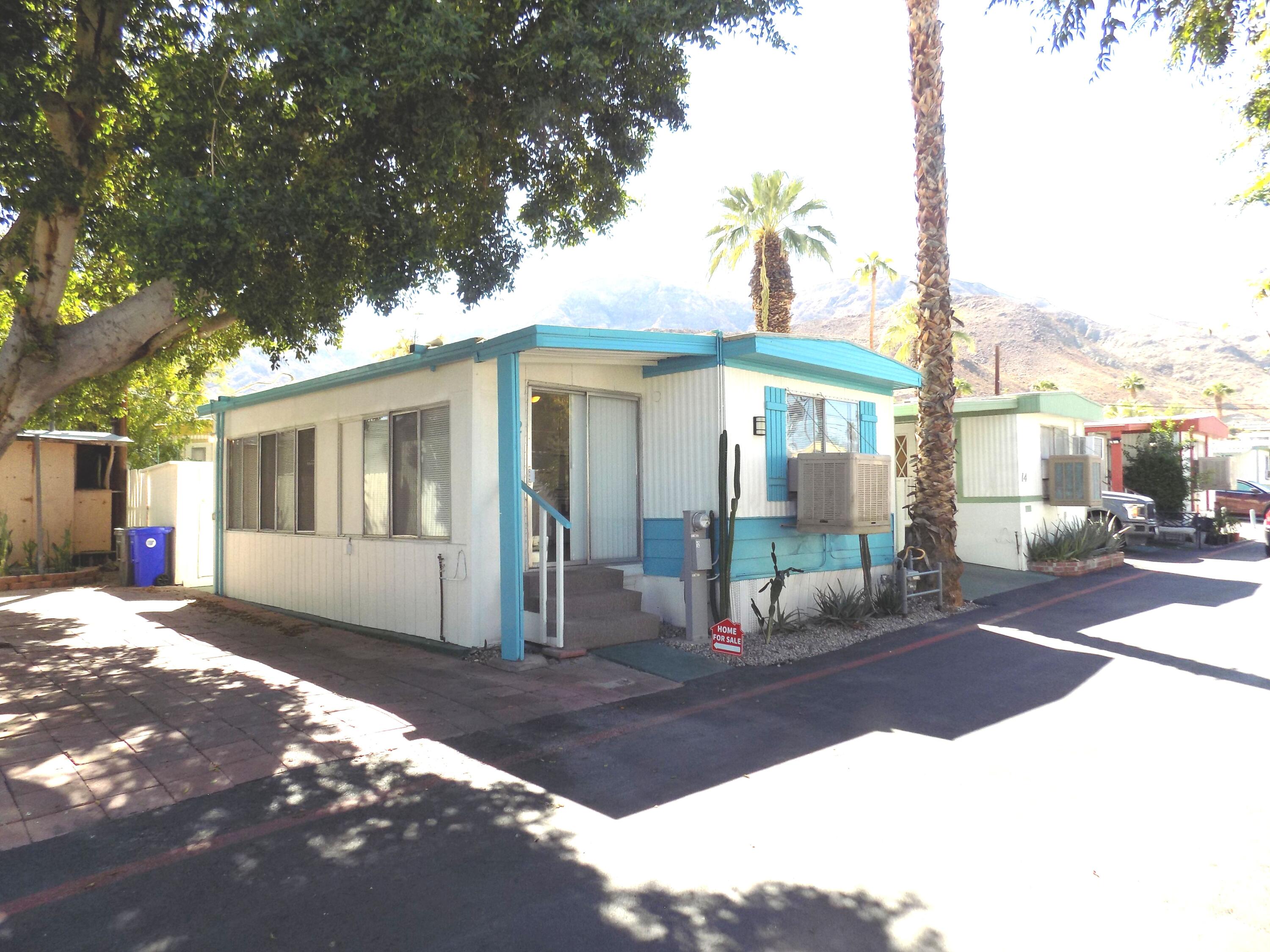 a front view of a house with a porch