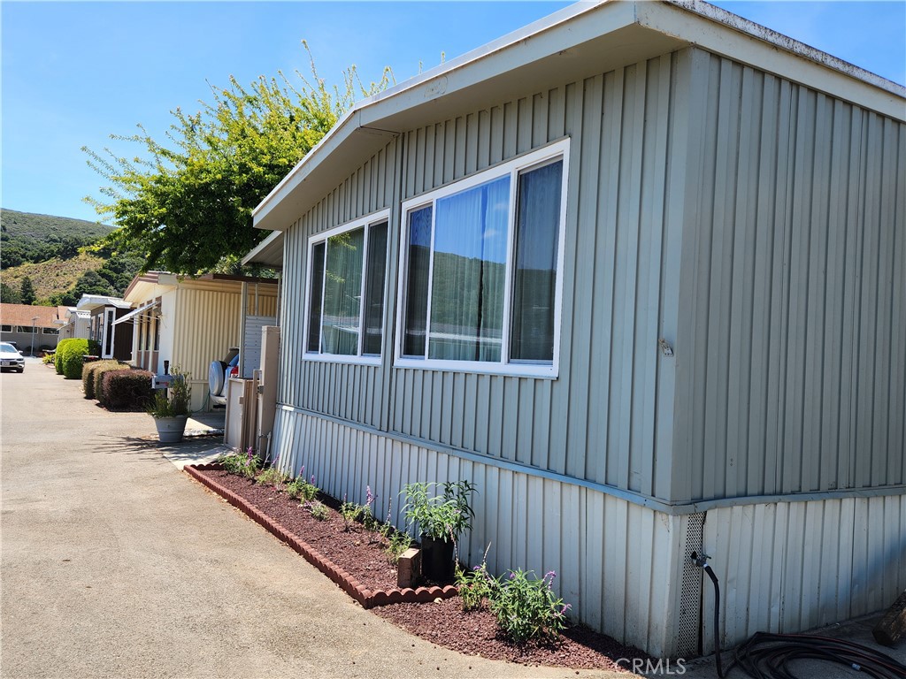 a front view of a house having yard