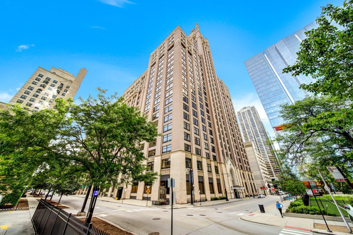 a view of a tall white building