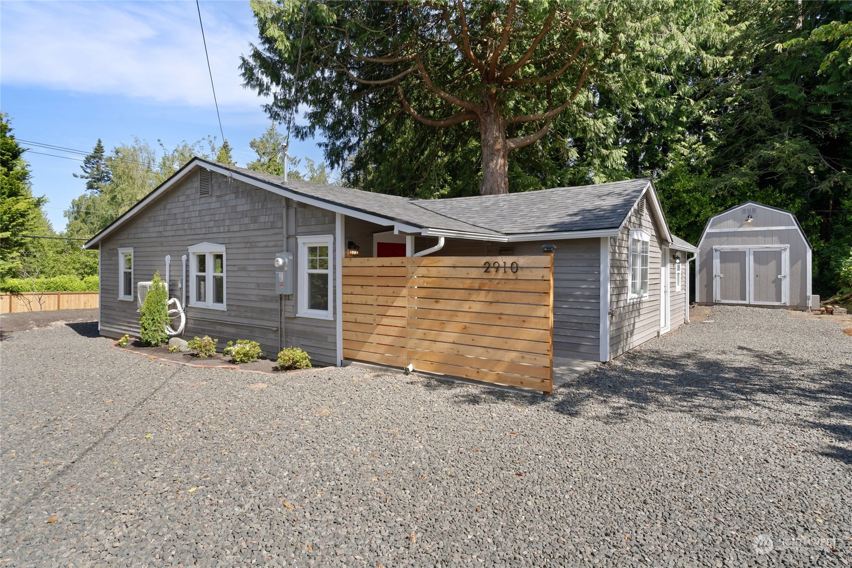 front view of a house with a small yard