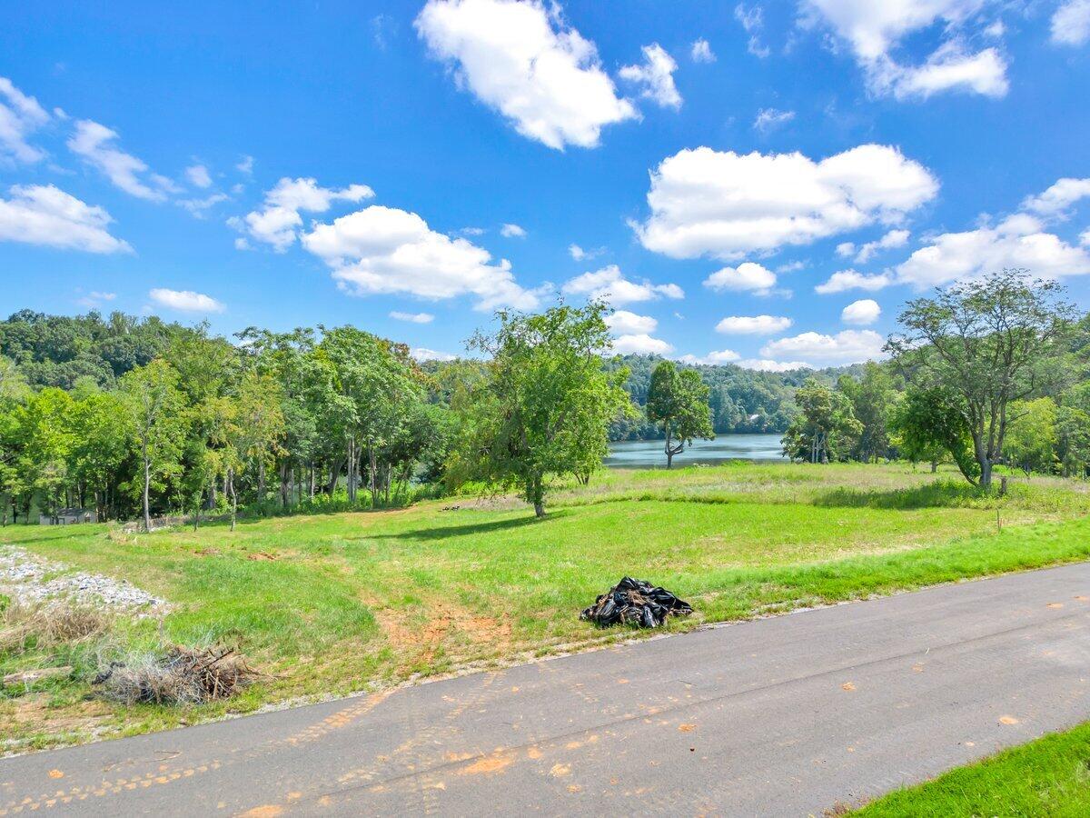 a view of a golf course with a big yard