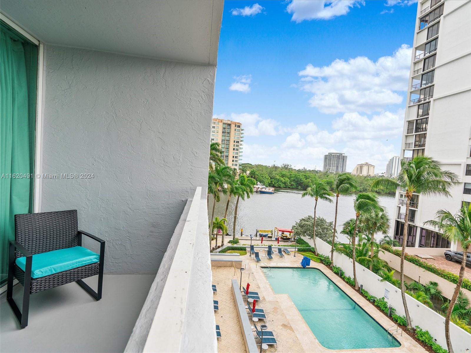 a balcony with view of city